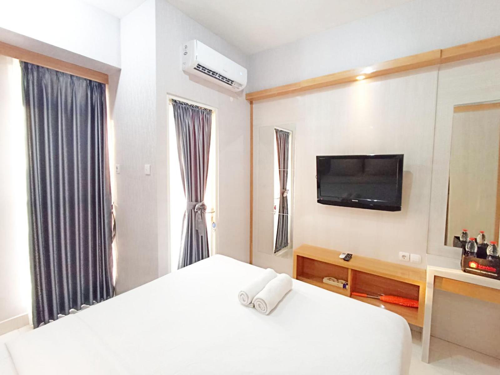 Apartemen And Homey Amartha View By Travelio